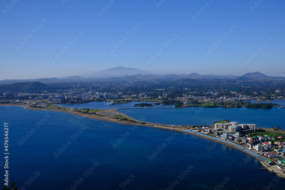 Blue sea and sky scenery of Seongsan Ilchulbong (UNESCO World Heritage Site) in Jeju Island, South Korea