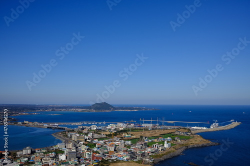 Blue sea and sky scenery of Seongsan Ilchulbong (UNESCO World Heritage Site) in Jeju Island, South Korea © seongjin