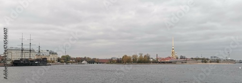 Peter and Paul Fortress in Saint Petersburg, Russia, As Seen from Neva River with Bell Tower of Saints Peter and Paul Cathedral On a Cloudy Autumn Day.