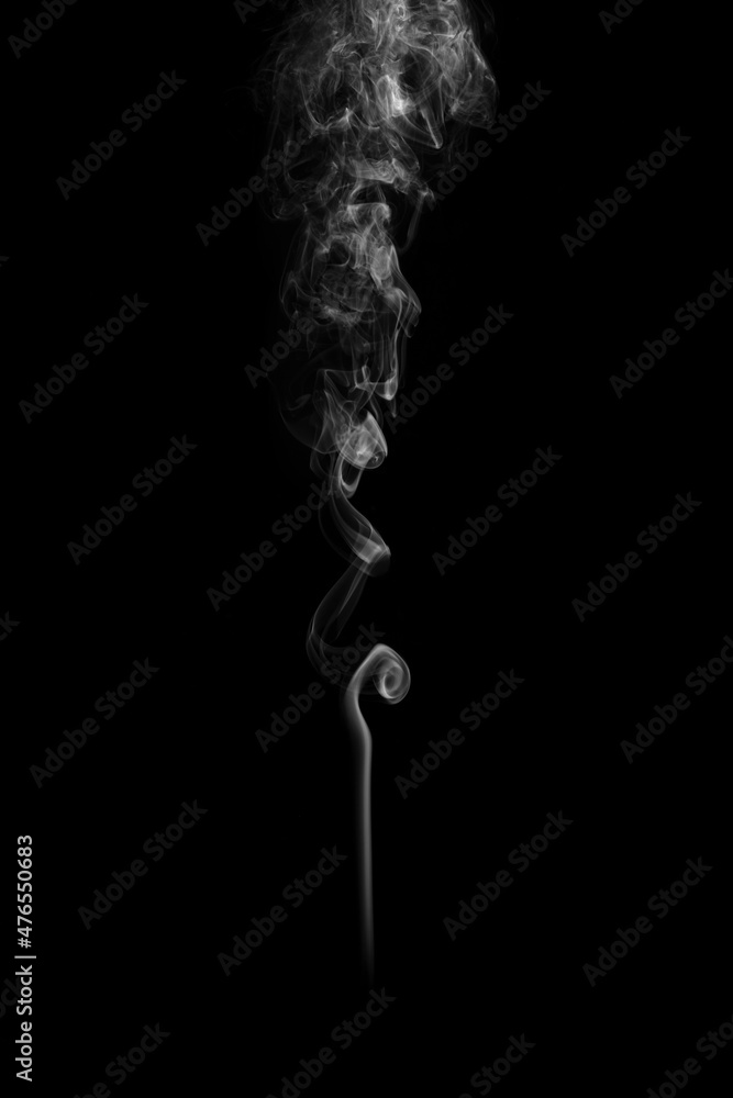Clouds of curls of smoke on a black background. Clouds of curls of smoke on a black background.