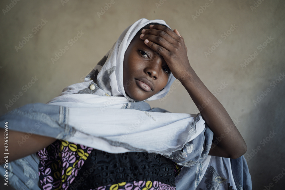 Beautiful black african teenage girl with a long and wide white scarf ...