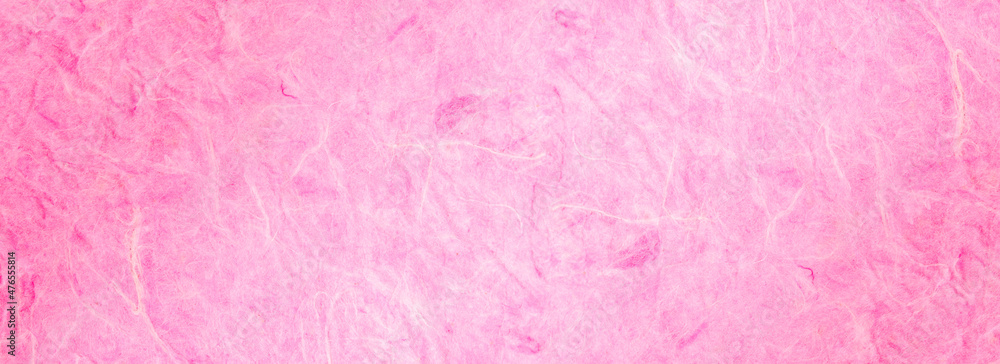 background of light pink, textured, handmade mulberry paper. background of light pink, textured, handmade mulberry paper.