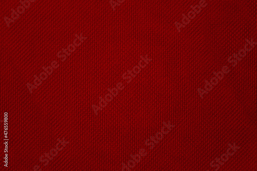 Red wool fabric with abstract pattern for texture background