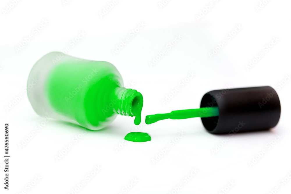 Set of multi-colored nail polish on a white background. Long banner. Manicure and pedicure selection of any colors. Liquid flows from the vial. Set of multi-colored nail polish on a white background. Long banner. Manicure and pedicure selection of any colors. Liquid flows from the vial.