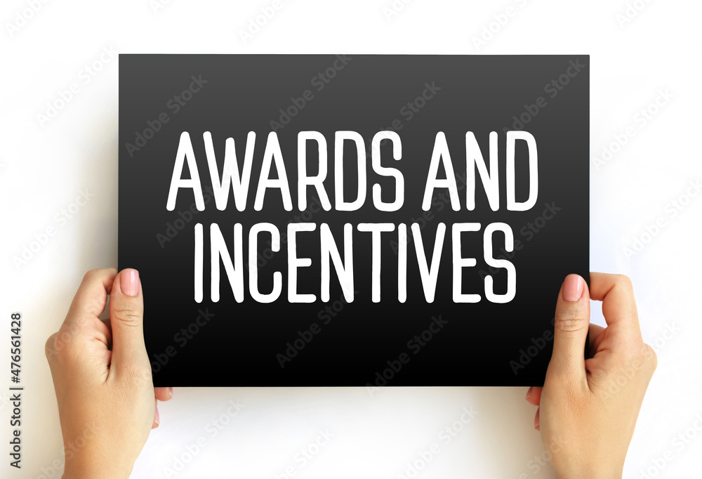Awards & Incentives text on card, concept background
