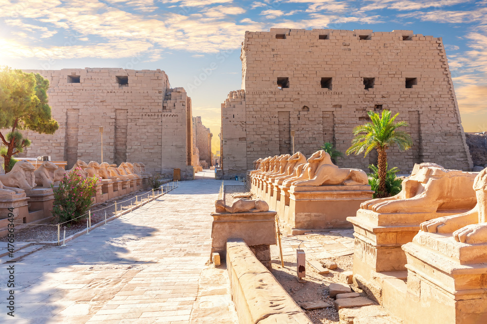 Ram-headed sphinx statues near Karnak Temple entrance, Luxor, Egypt