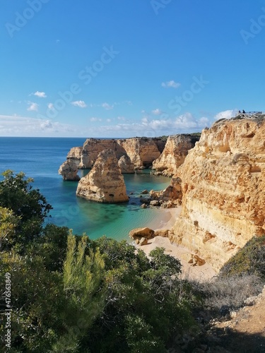 The stunning beautiful coastline landscapes along the Algarve in Portugal during sunset © ChrisOvergaard