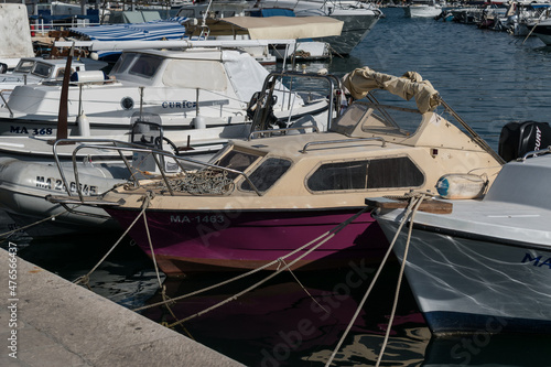 Moored boats at the port in the city of Makarska, Dalmatia, Croatia. © slobodan