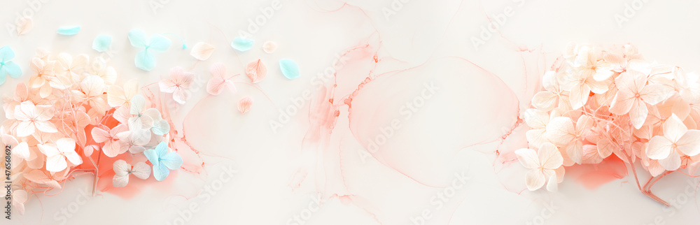 Creative image of pastel blue and pink Hydrangea flowers on artistic ink background. Top view with copy space
 - obrazy, fototapety, plakaty 