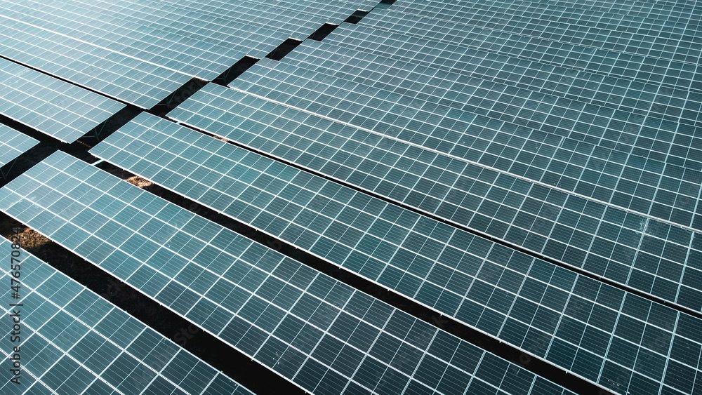 Solar cell panel from aerial view. Photo landscape of a solar farm producing clean energy. Solar cell panel from aerial view. Photo landscape of a solar farm producing clean energy.