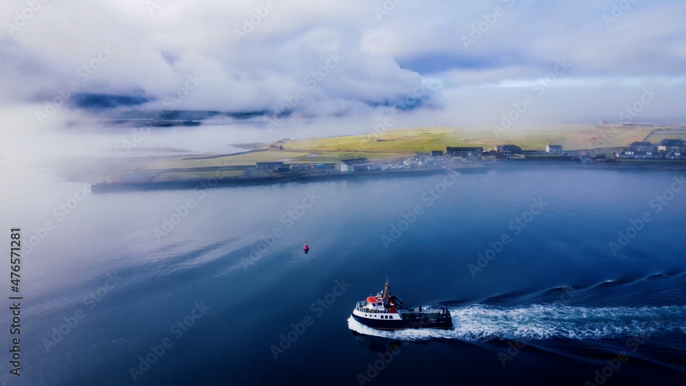 Naklejka premium The Island ferry making a dawn crossing to Hoy - Orkney Islands