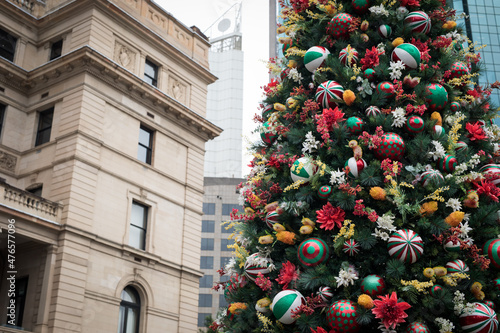 Photography Large christmas tree decorations baubles green red white historic old sandstone