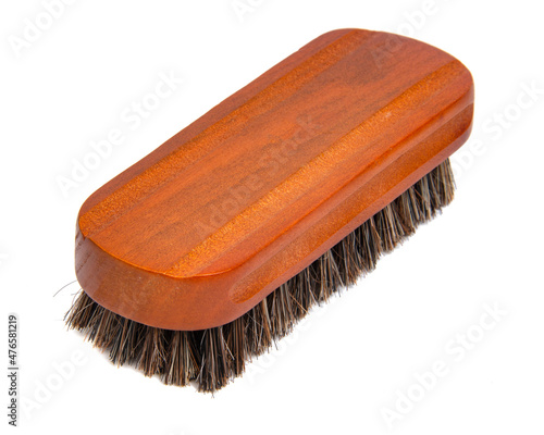 wooden brush for shoes isolated on the white background