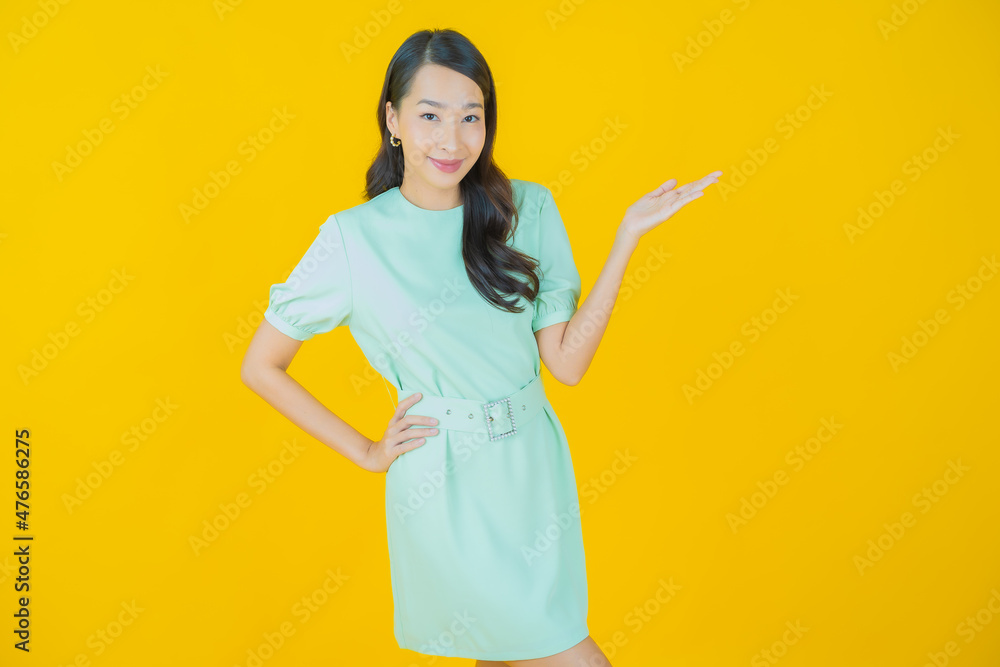 Portrait beautiful young asian woman smile with action Portrait beautiful young asian woman smile with action