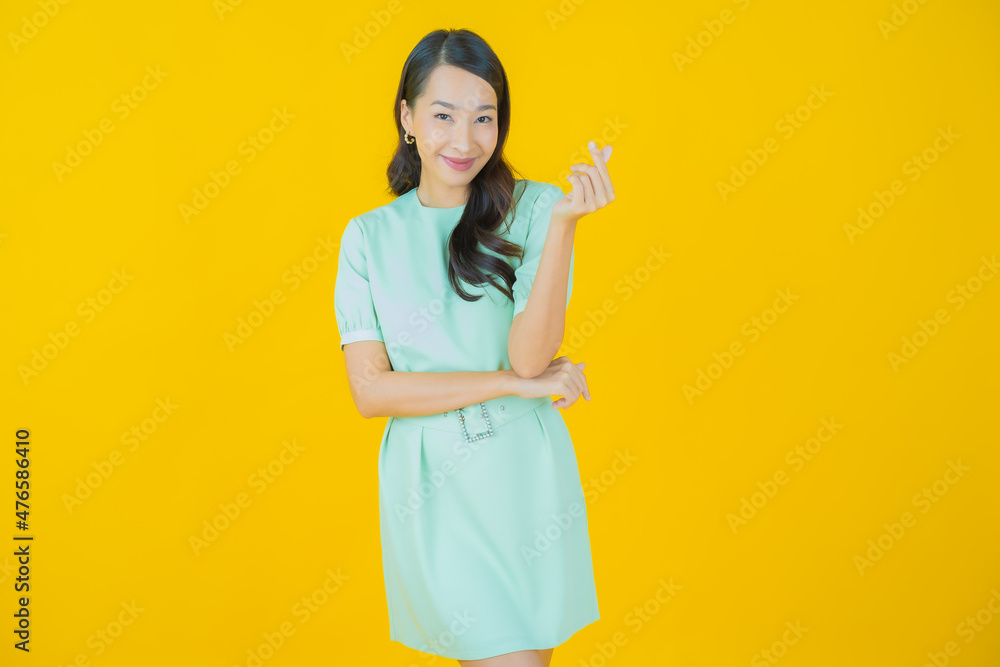 Portrait beautiful young asian woman smile with action Portrait beautiful young asian woman smile with action