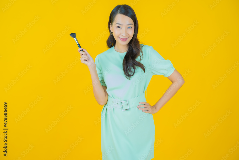 Portrait beautiful young asian woman with make up brush cosmetic Portrait beautiful young asian woman with make up brush cosmetic