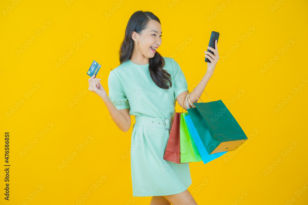 Portrait beautiful young asian woman smile with shopping bag Portrait beautiful young asian woman smile with shopping bag