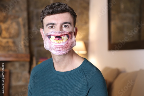 Fototapeta Comedic image of man with missing teeth