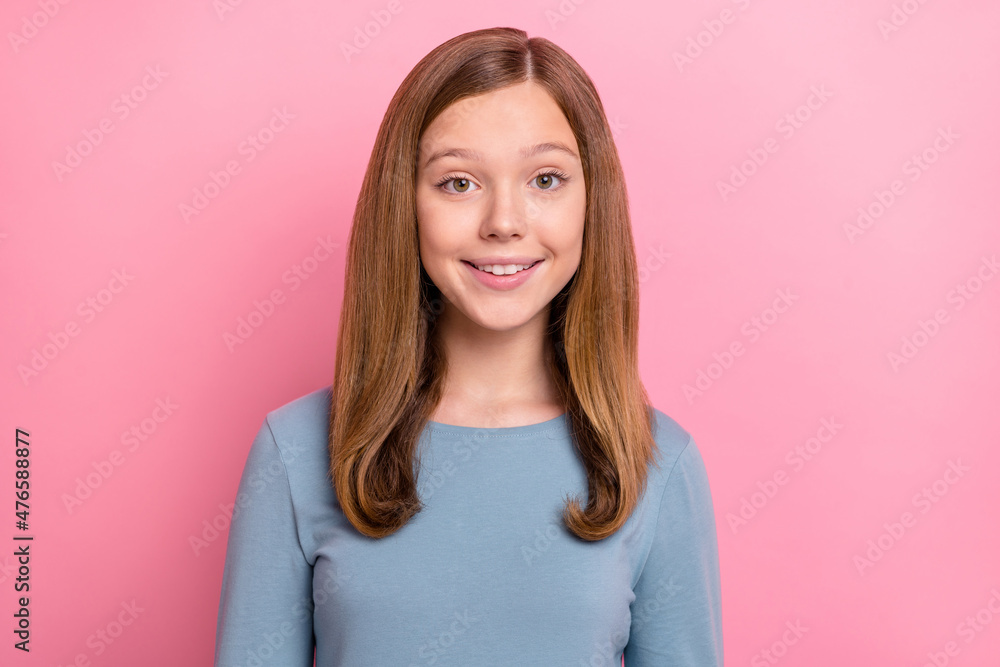 Portrait of attractive cheerful cute brown-haired teen girl smiling isolated over pink pastel color background Portrait of attractive cheerful cute brown-haired teen girl smiling isolated over pink pastel color background