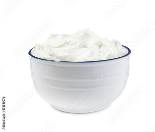 Bowl of tasty cream cheese isolated on white