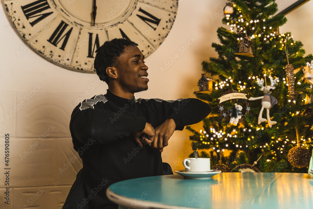 black boy gestures in a bar