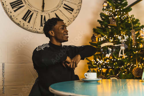 black boy gestures in a bar