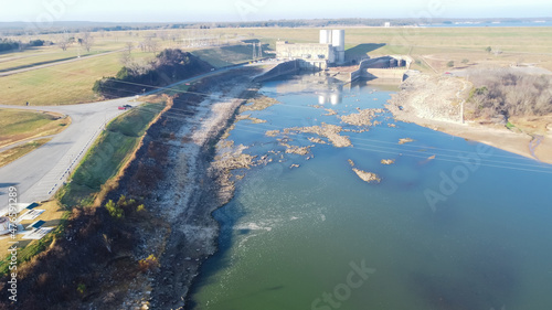 Aerial view Texas side of Denison Dam with hydroelectric turbine powerhouse impounds Lake Texoma photo