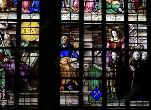 Stained Glass Window Detail Depicting Kneeling Women and a Queen at the Oude Kerk Church in Amsterdam, Netherlands