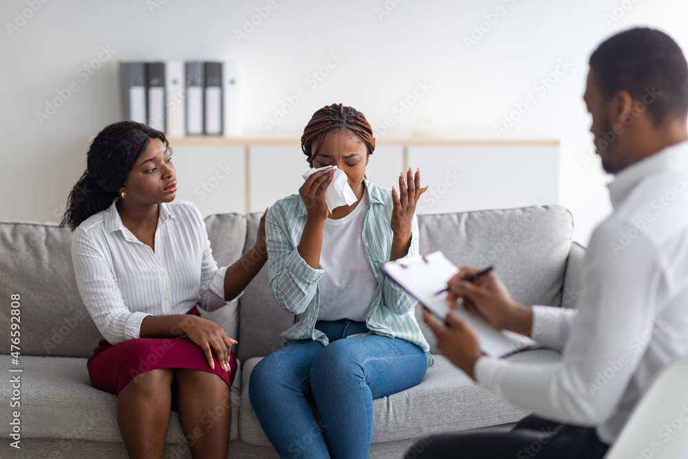 LGBT lesbian couple consulting phychologist at medical office. Homosexual marriages problems LGBT lesbian couple consulting phychologist at medical office. Homosexual marriages problems