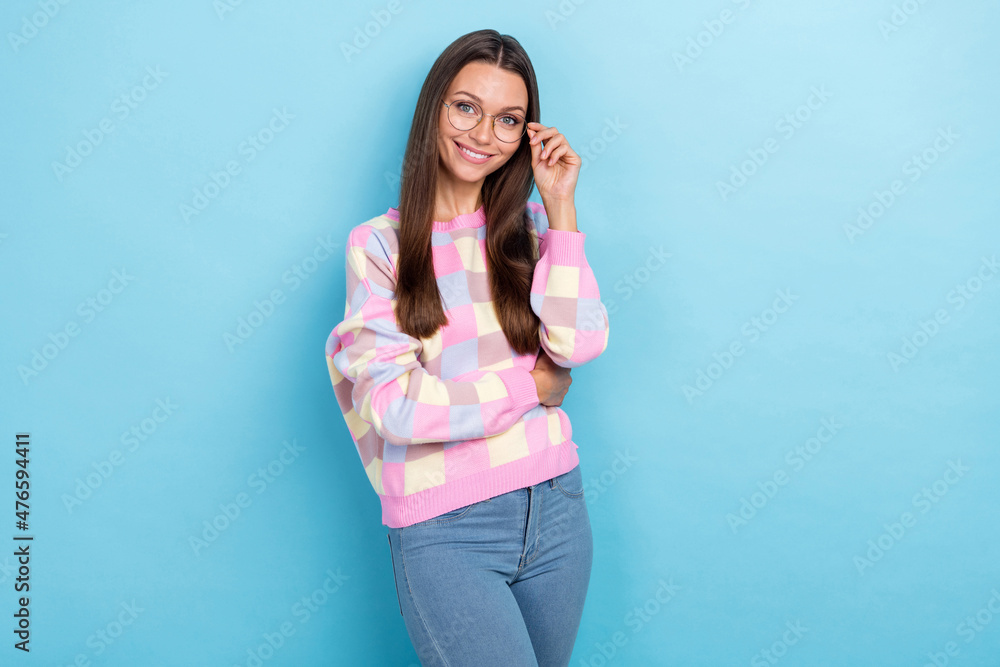 Photo of pretty cute confident freelancer lady posing wear specs pullover isolated blue color background Photo of pretty cute confident freelancer lady posing wear specs pullover isolated blue color background
