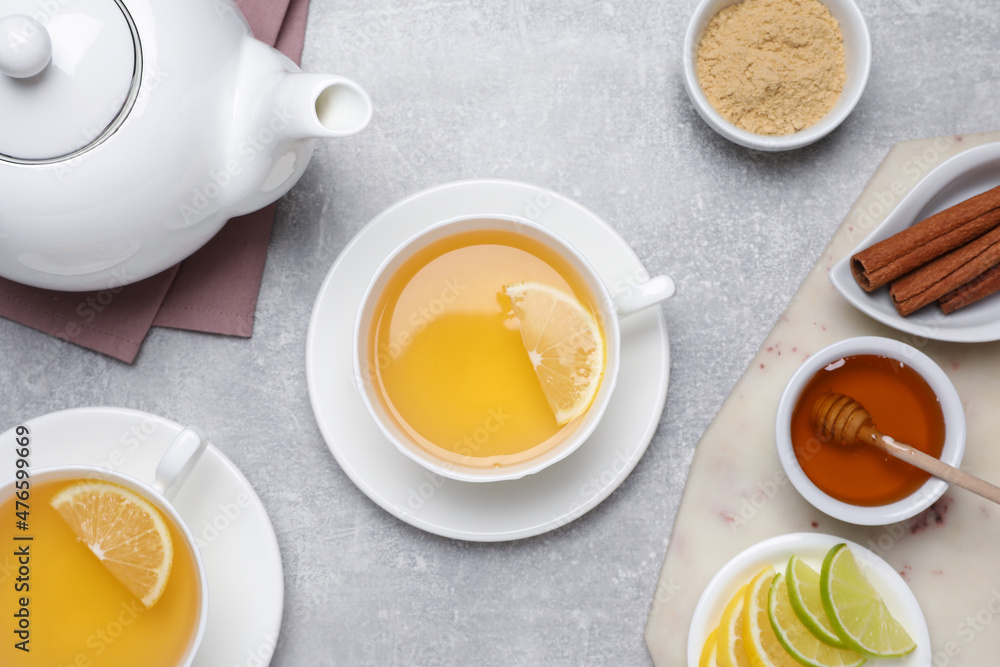 Flat lay composition with immunity boosting drink on light grey marble table Flat lay composition with immunity boosting drink on light grey marble table