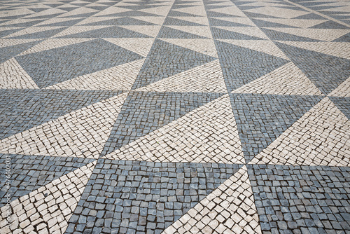 cobblestone pavement in grey tones, with triangular pattern photo