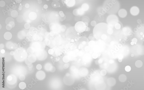 White Glitter Vintage Lights on Gray Texture Background. White Bokeh Effect. Defocused, Celebration, Christmas Holiday Backdrop.