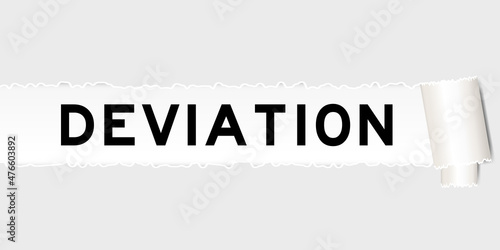 Ripped gray paper background that have word deviation under torn part