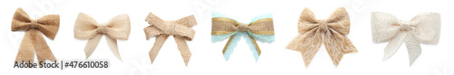 Set with different pretty burlap bows on white background. Banner design