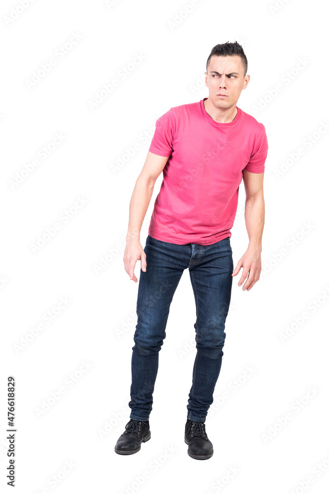 Suspicious man frowning and looking away Suspicious man frowning and looking away
