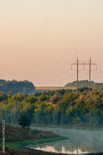 power lines on the river © Александр Рябинин