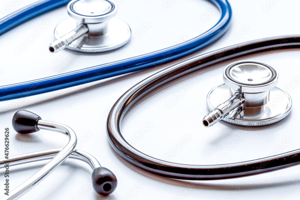 two disassembled stethoscope in white background two disassembled stethoscope in white background