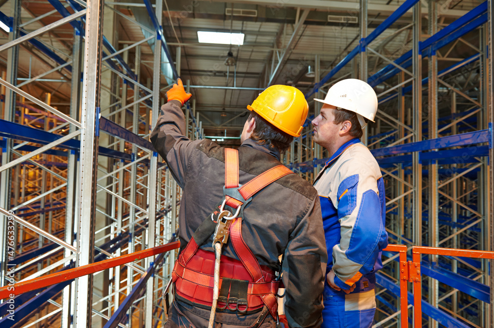 warehouse workers engineers in new modern storehouse warehouse workers engineers in new modern storehouse