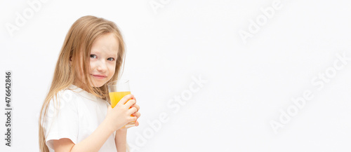 Cute little girl with the orange juice on white banner copy space