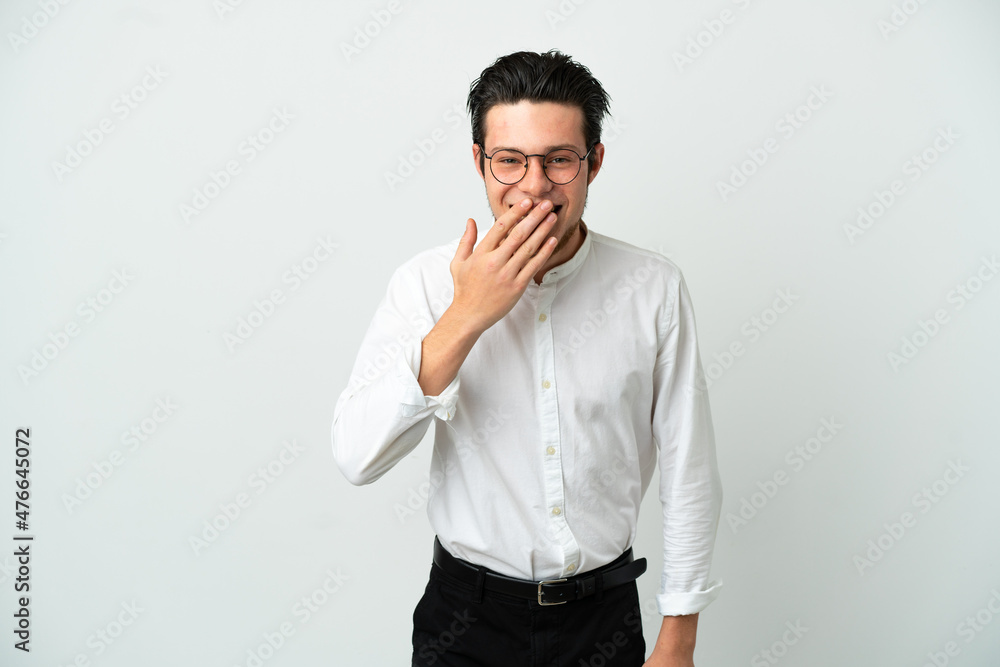 Russian Business man isolated on white background happy and smiling covering mouth with hand Russian Business man isolated on white background happy and smiling covering mouth with hand