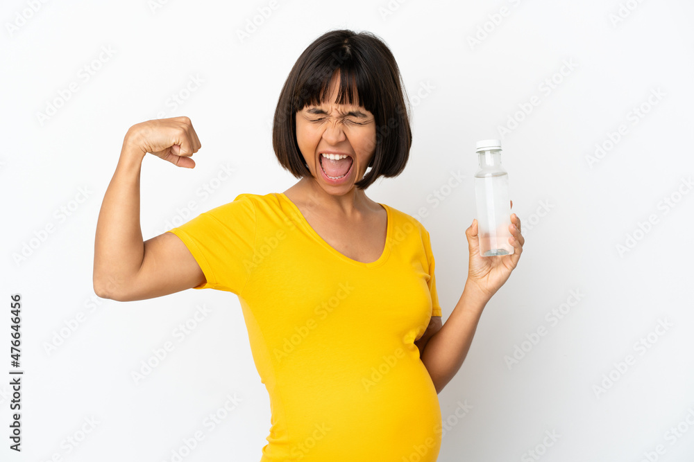 Young pregnant woman holding a bottle of water isolated on white background doing strong gesture Young pregnant woman holding a bottle of water isolated on white background doing strong gesture