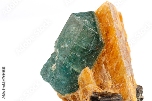 macro stone mineral apatite in calcite on a white background photo