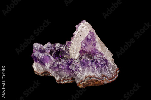 macro mineral amethyst stone with calcite black background