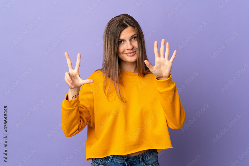 Young Slovak woman isolated on purple background counting eight with fingers Young Slovak woman isolated on purple background counting eight with fingers