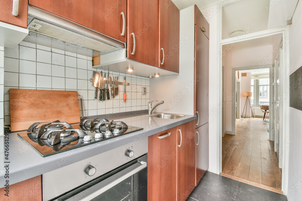 Kitchen interior with cabinets and stove Kitchen interior with cabinets and stove
