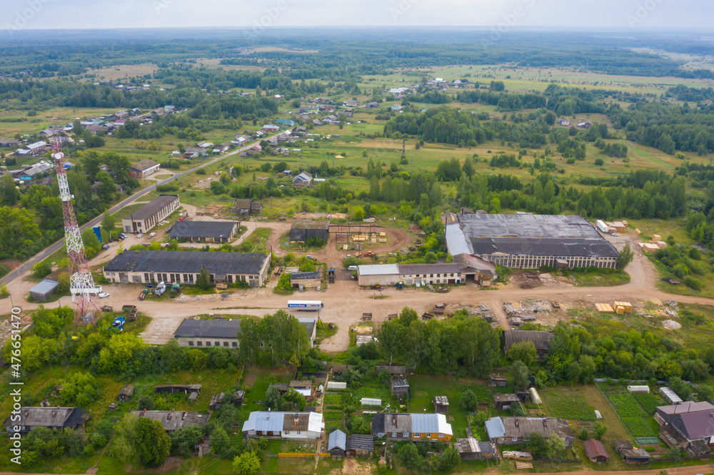 Aerial view from a drone of a rural village in the Kirov region, private houses and vegetable gardens in the village of Arbazh.
