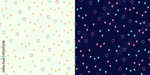 Cute little hearts in blue, pink and yellow..A set of simple seamless patterns in a minimal style. Valentine's Day or Birthday Packaging