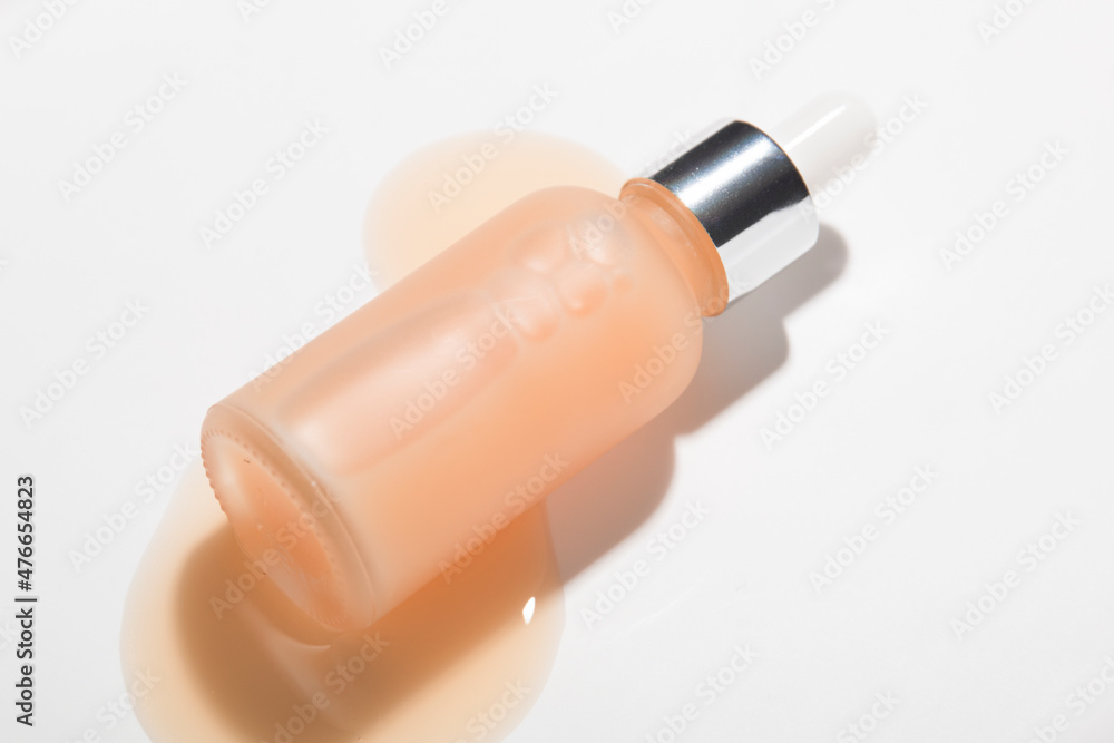 Natural cosmetic products on a light background. Mockup of cosmetic bottles. Natural cosmetic products on a light background. Mockup of cosmetic bottles.