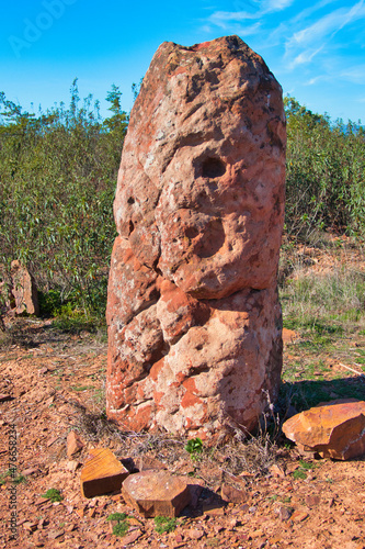 Sandstone menhir, dating from 6000-4500 BC, in the dry hills near Vale Fuzeiros, Algarve, Portugal.
 photo